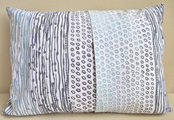 The same cushion showing the fold over opening